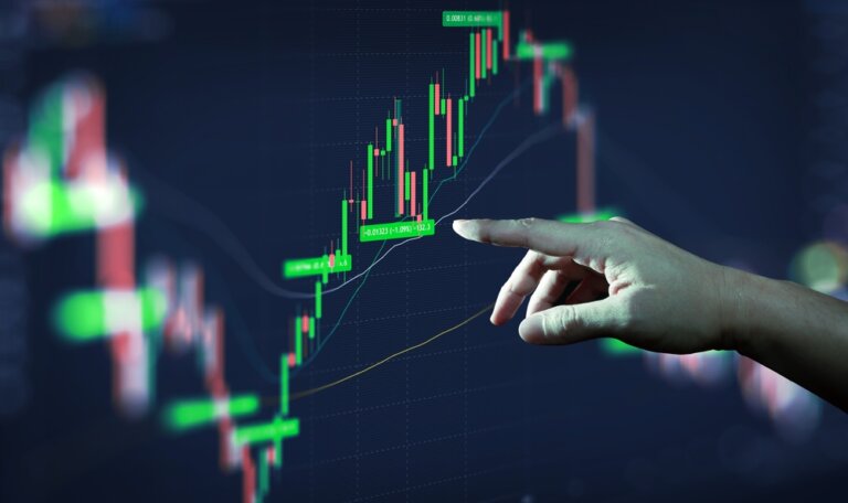 Businessman,Hand,Analysing,Financial,Stock,Market,Graph,On,Board.,Trading