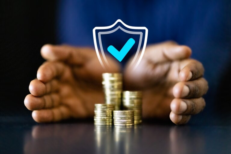 African,American,Businessman,Counting,Coins,To,Protect,Income,And,Invest