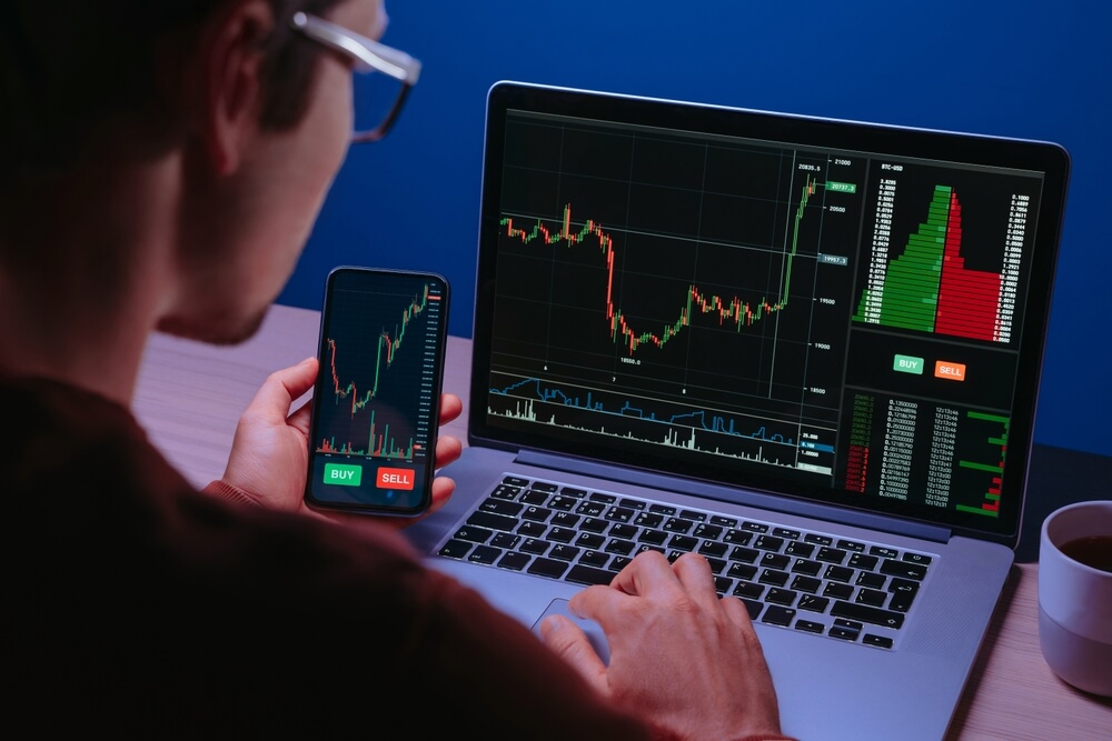 Over,Shoulder,View,Of,Crypto,Trader,Analyzing,Live,Crypto,And
