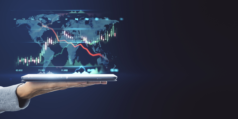 World,Market,Trading,Concept,With,Digital,Tablet,On,Human,Hand