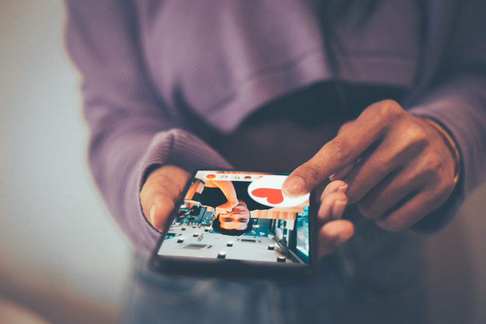 A,Woman,Using,A,Phone,For,A,Dating,App