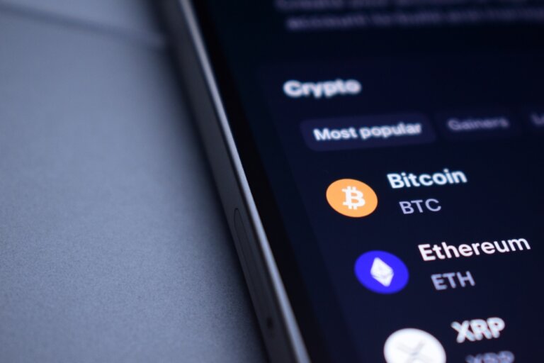 Cryptocurrency,Applications,Appear,On,The,Smartphone,Screen.,Binance,,Bybit,,Bitget,