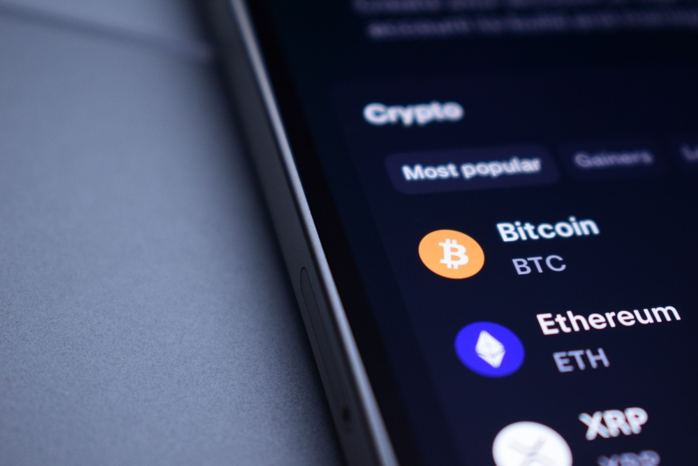 Cryptocurrency,Applications,Appear,On,The,Smartphone,Screen.,Binance,,Bybit,,Bitget,
