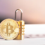 Bitcoin(btc),Coin,With,Padlock,Lying,On,Computer,Background.,Bitcoin,Security.