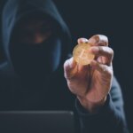 Crypto,Currency,Bitcoin,Holding,By,Hacker,From,Scam.
