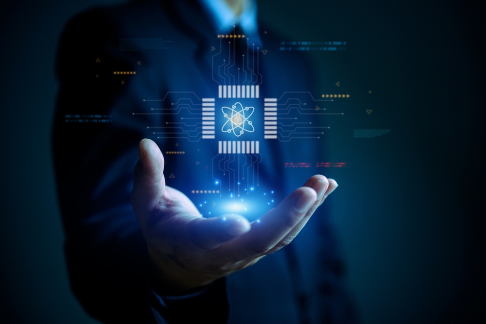 Businessman,Holding,Digital,Chip,With,Quantum,Computing,Encryption,Symbol,,Representing
