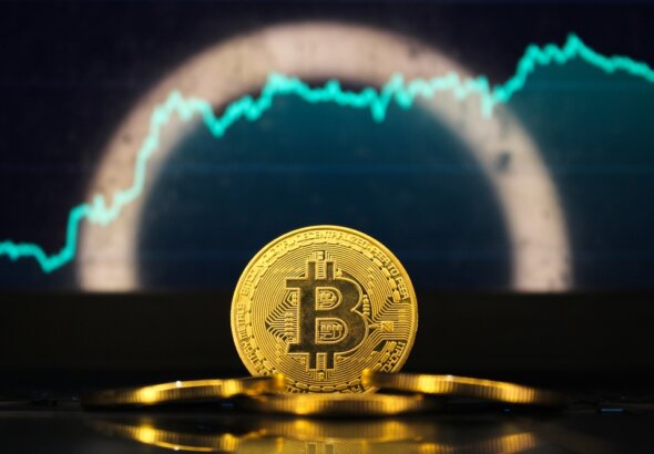 Bitcoin,Stands,In,Front,Of,A,Green,Rising,Price,Chart,