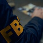 Close,Up,On,Fbi,Sign,On,Uniform,Of,The,Agent,