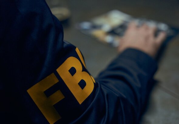 Close,Up,On,Fbi,Sign,On,Uniform,Of,The,Agent,