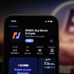 Munich,,Germany;,10,March,2023:,A,Man,Holds,An,Iphone